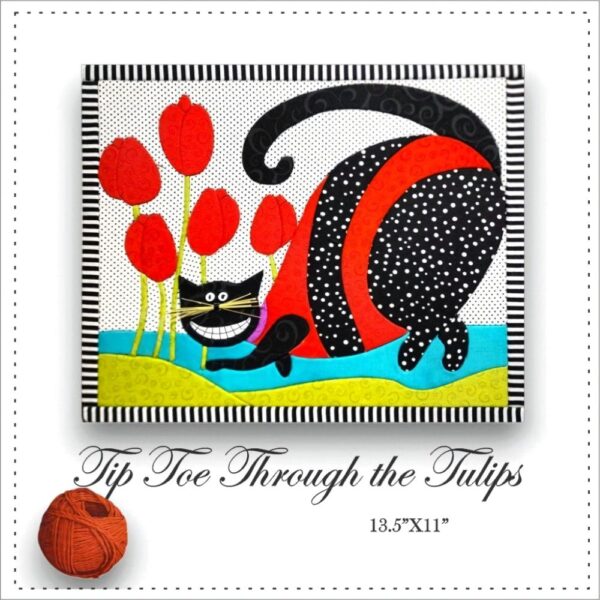 Cheshire cat tip toeing through the tulips